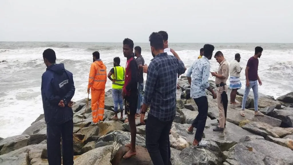 kundapura Young man splashes water at Maravante beach